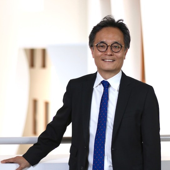 Professional headshot of CW MBA faculty member Youngjin Yoo