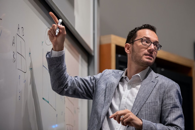 Associate Professor of Economics, Roman Sheremata, teaches a course at the Weatherhead School of Management